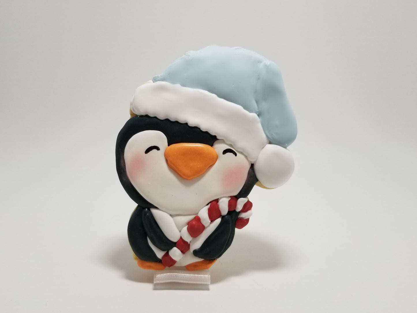 Penguin holding a candy cane cookie cutter, Christmas Cookie Cutters